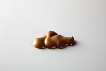 Shades Of Foundation On White Background. Makeup Product Texture.