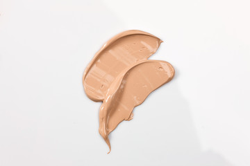 Shades Of Foundation On White Background. Makeup Product Texture.