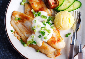 Fried Basa Fillet with sauce, mashed potato and fresh vegetables