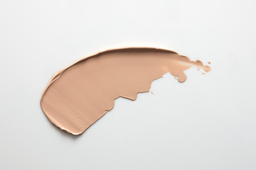 Shades Of Foundation On White Background. Makeup Product Texture.