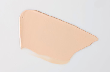 Shades Of Foundation On White Background. Makeup Product Texture.