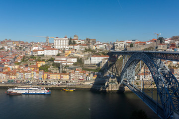 Fototapeta na wymiar View of the historic city of Porto with famous bridge Ponte dom Luis