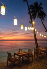 Outdoor сafe on the beach during sunset on Koh Chang island, Thailand.