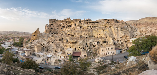 Fototapeta na wymiar Cavusin fortress and church Vaftizci Yahya, Saint John the Baptist in Cappadocia, Turkey