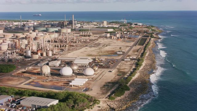 Aerial view of refinery on coast