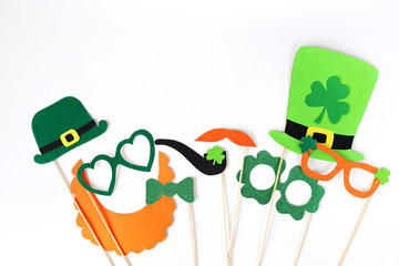 Festive masks for a St. Patrick's Day on a white background.