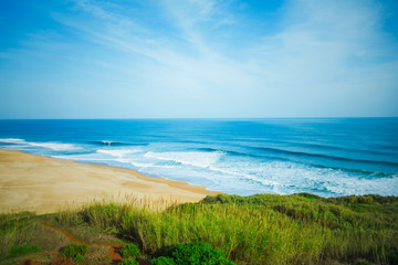 huge sandy beach with big waves