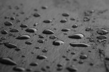 Dark gray black slate background or texture of natural stone.