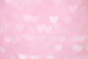 Bokeh background, pink heart shape. Valentines Day