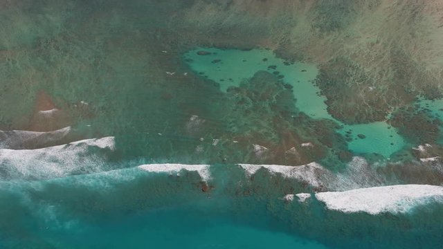 Honolulu, Oahu, Hawaii circa-2018.  Aerial view of coral reef off the coast of Oahu.  Shot with Cineflex and RED Epic-W Helium. 