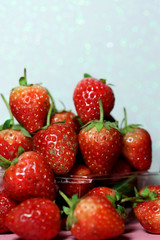 Strawberry on glitter blue background and have space for write wording, sweet romantic fruit for special person, lovers in Valentine day, make many dessert menu or juice or dairy strawberry flavor