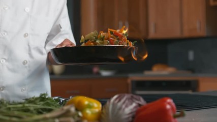Flaming stir-fry in super slow motion