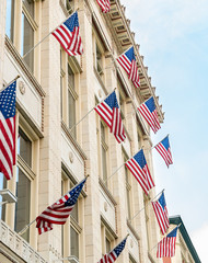 American flags hung off side of building complex in Denver, Colorado
