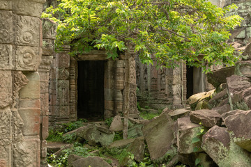 Pile of rocks beside two temple doorways