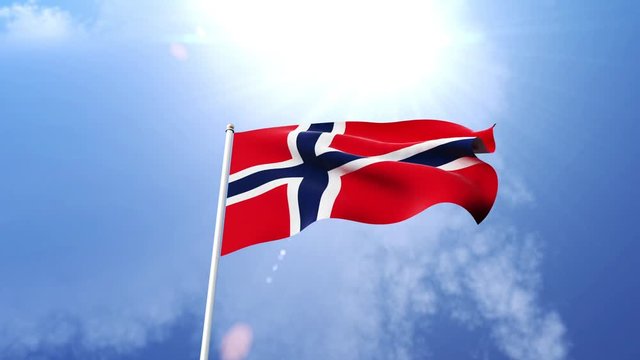 The national flag of Norway waving in the wind on a sunny day.  Beautiful slow motion shot of the Norwegian flag.