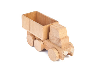 Photo of a wooden car truck made of beech on a white isolated background