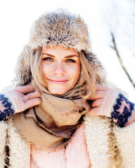 young pretty teenage hipster girl outdoor in winter snow park ha