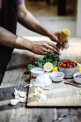 Fresh organic vegetables and ingredients prepared on a cutting board