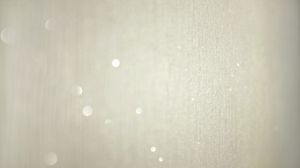 Silver glitter background with bokeh