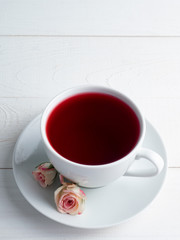 White Cup with tea on white background