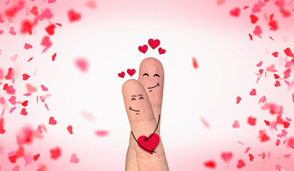 Obraz na płótnie Canvas Happy finger couple in love celebrating Valentine’s day