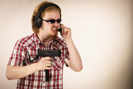 Gamer man shooting from gun