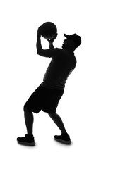 Silhouette of man playing basketball on white background