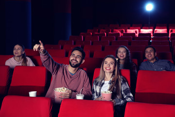People watching movie in cinema