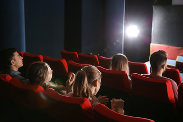 People watching movie in cinema