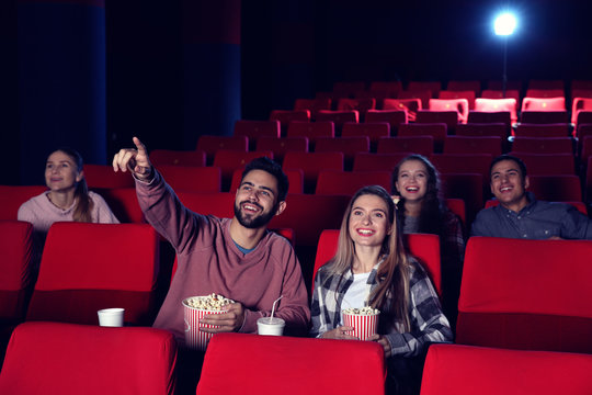 People watching movie in cinema