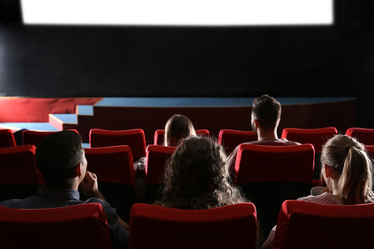 People watching movie in cinema