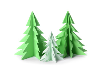 Obraz premium Green origami fir trees on white background