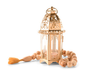 Muslim lamp as Ramadan symbol and tasbih on white background