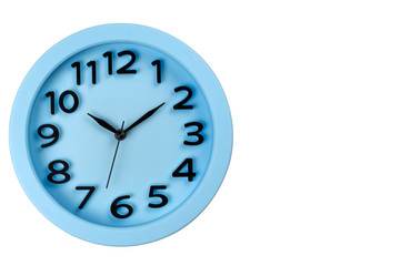 Close-up of the blue clock face with three-dimensional numbers. Isolated