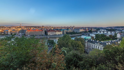 Fototapeta na wymiar Evening sunset Panorama of Prague with Vltava river and Prague Bridges timelapse.