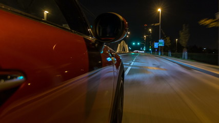 Car moves at fast speed at the night streets timelapse hyperlapse drivelapse.