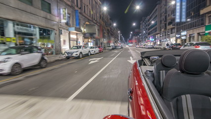 Car moves at fast speed at the night avenue timelapse hyperlapse drivelapse.