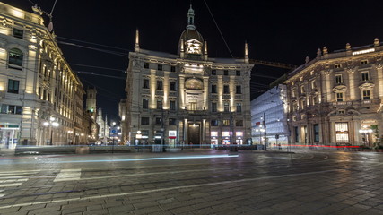 Fototapeta na wymiar Piazza Cordusio is an important commercial square in the city night timelapse hyperlapse