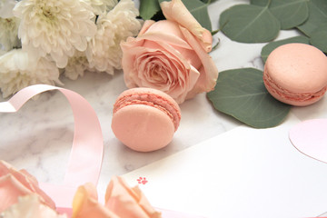 Composition for Valentine's day, macaroons, rose, eucalyptus, pink envelope