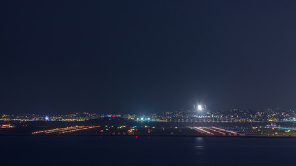 Naklejka na ściany i meble Aerial view of the airport of Nice in South France timelapse