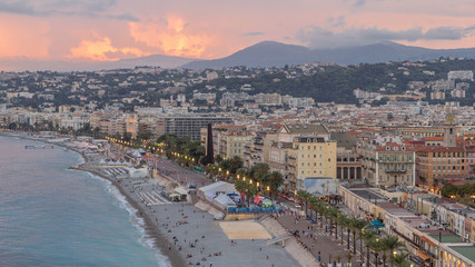 Fototapeta premium Panorama over Nice city and Mediterranean Sea aerial day to night timelapse