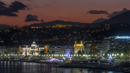 Waterfront of Nice city and Mediterranean Sea day to night timelapse