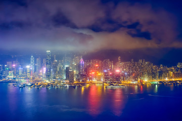 Fototapeta na wymiar Aerial view of illuminated Hong Kong skyline. Hong Kong, China