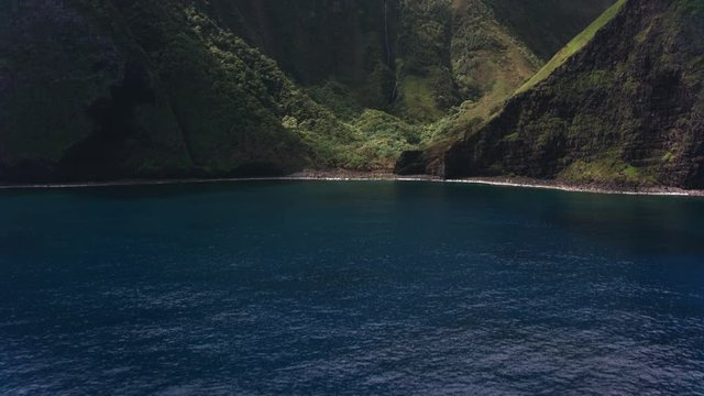 Molokai, Hawaii circa-2018.  Aerial view of Pu'uka'oku Falls on Molokai.  Shot with Cineflex and RED Epic-W Helium. 