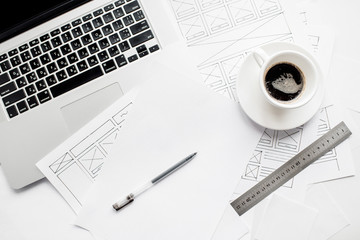 UX website designer drawing wireframe sketch of prototype, framework, layout future project....