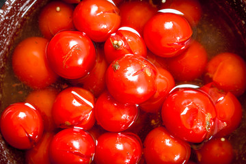 Pickled tomatoes with spices.