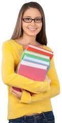 Beautiful young female student holding books