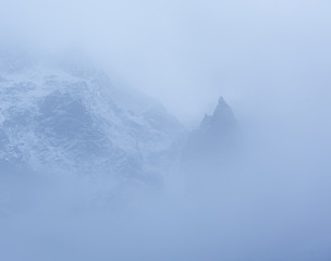 Fototapeta na wymiar mountains and foggy clouds