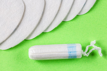 Means of protection of female hygiene. Hygienic tampons and pads. Organic gaskets made of bio-cotton. Menstrual cycle © innazagorulko