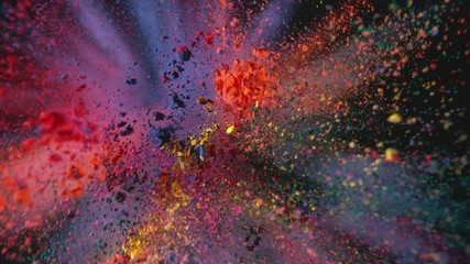 Colorful powder exploding on black background in super slow motion, shot with Phantom Flex 4K